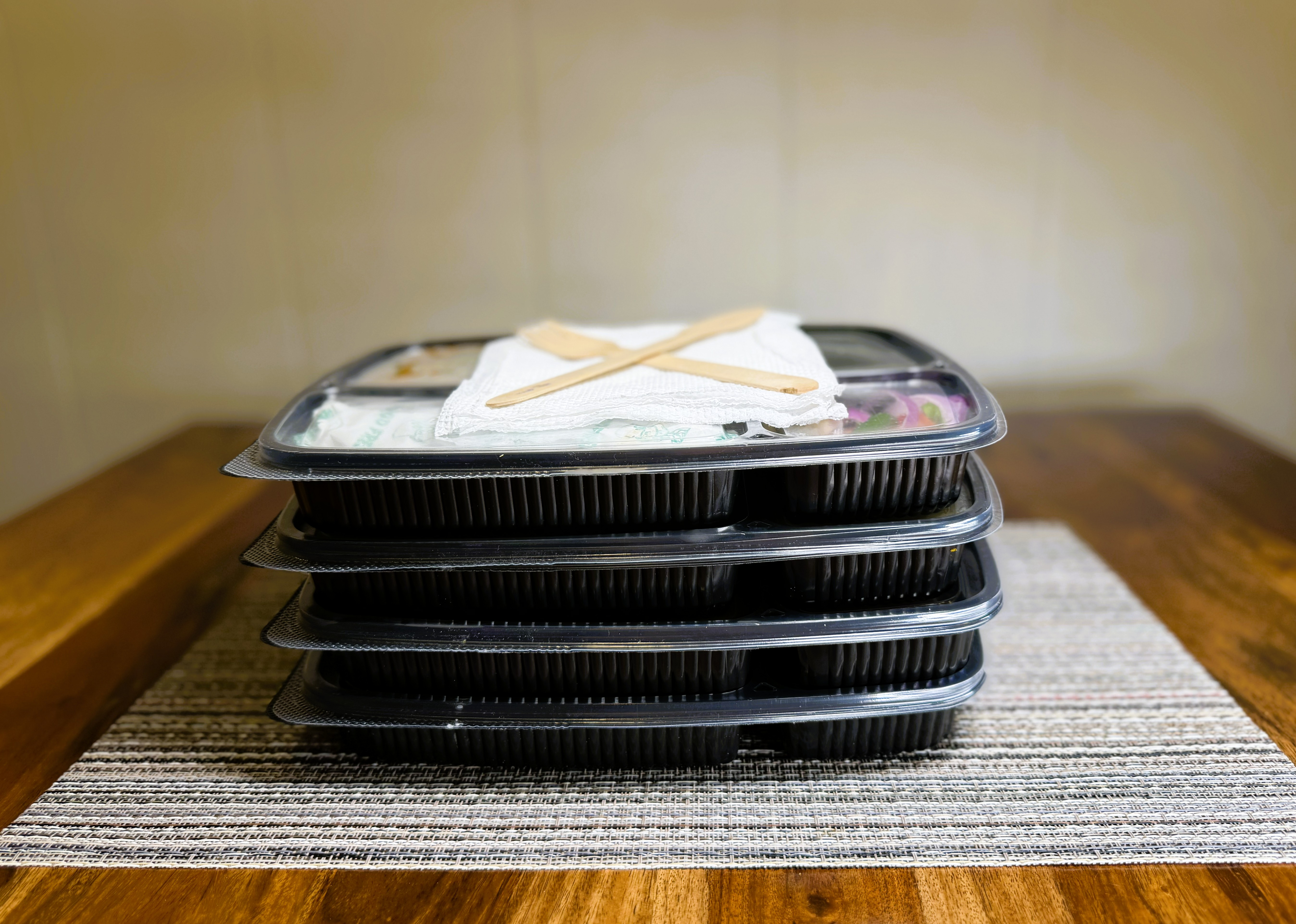 FiTiffin meal boxes stacked - fresh tiffin delivery