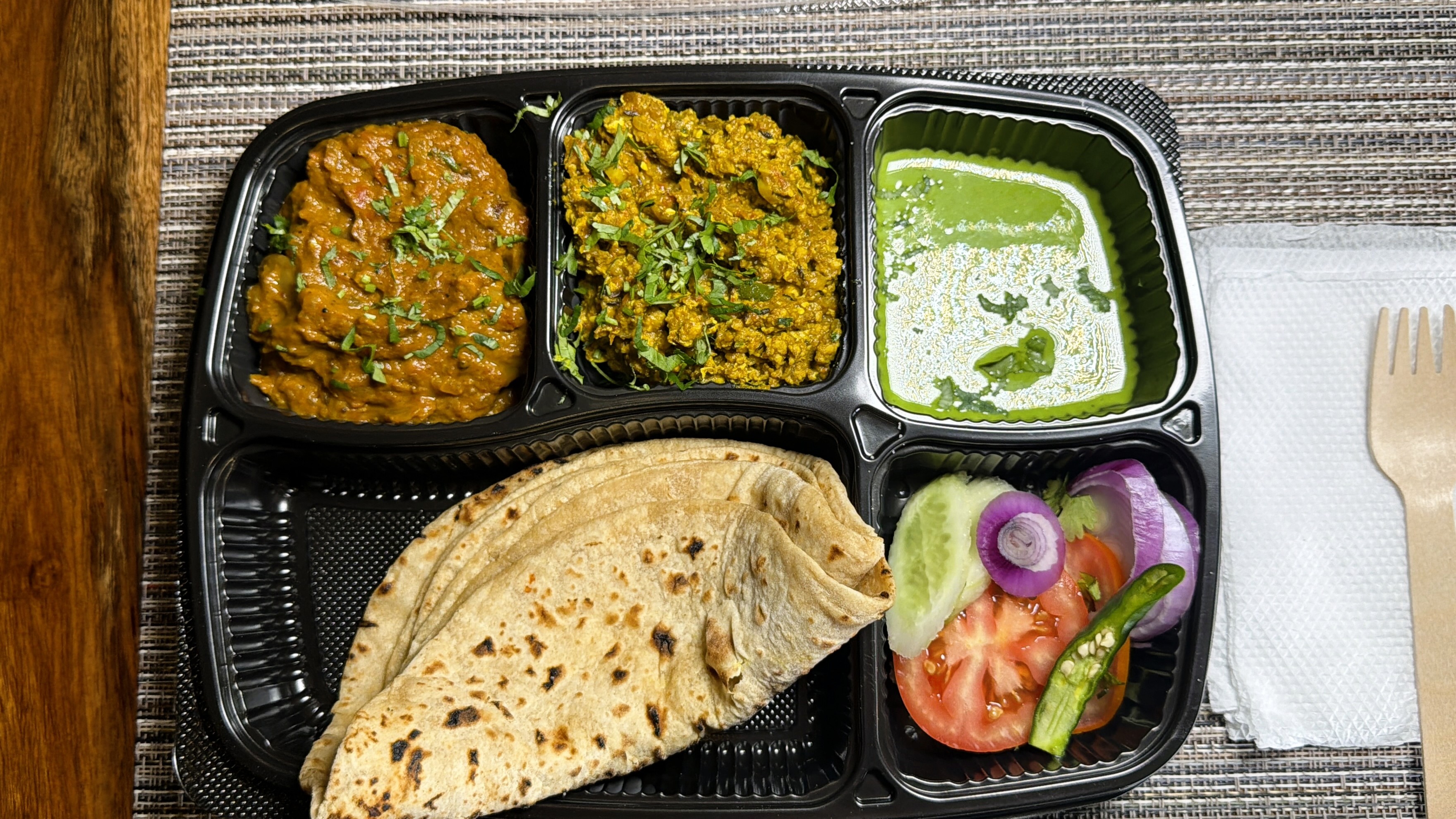 FiTiffin non-vegetarian thali - complete meal with rice, curry and salad